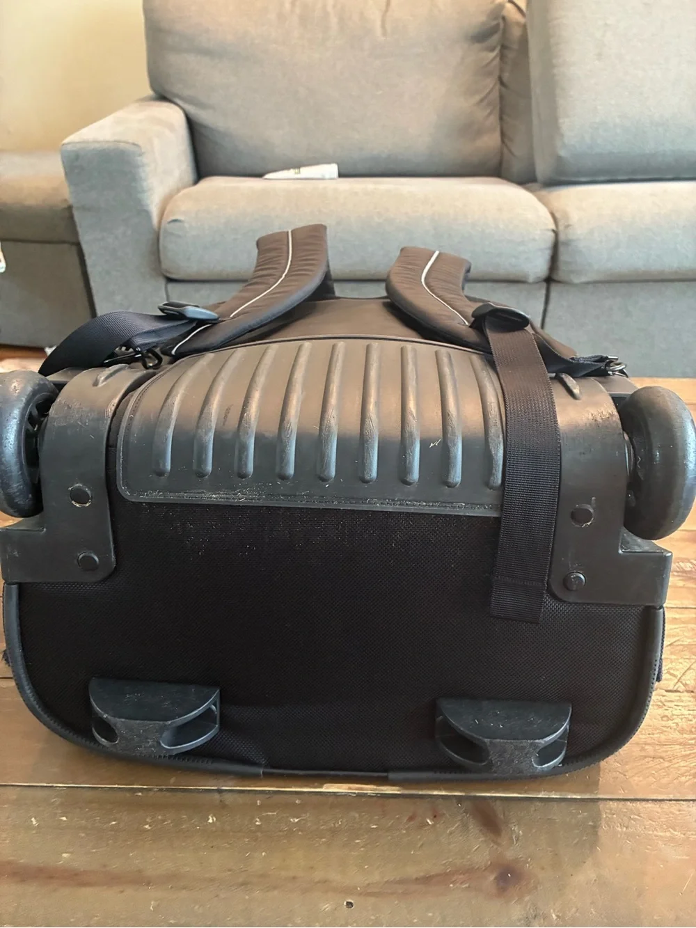 L.L. Bean Black Rolling Backpack with Silver Reflective Accent